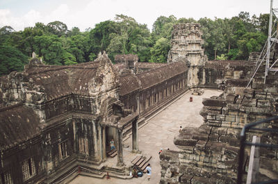 Panoramic view of temple and building against sky