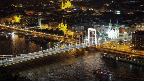 High angle view of bridge over river at night