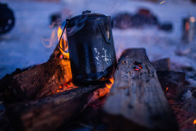 Close-up of fire on log