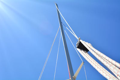 Low angle view of bridge against clear blue sky