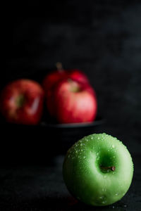 Fresh green red apples dark background dark food photography