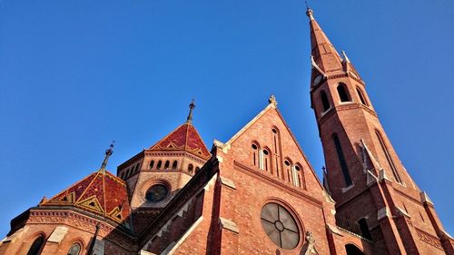 High section of church against blue sky