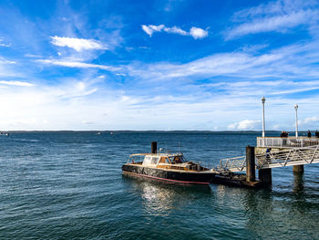 Boat in sea against sky