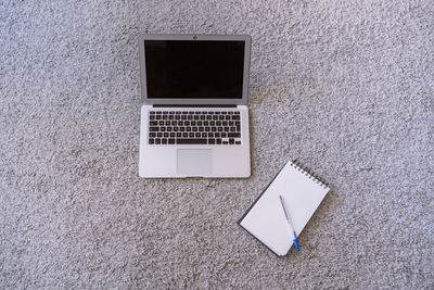 Close-up of text on white wall