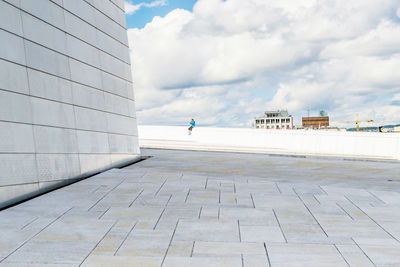 Boy on the terrace of the opera house in oslo
