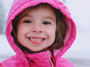 Close-up portrait of smiling girl