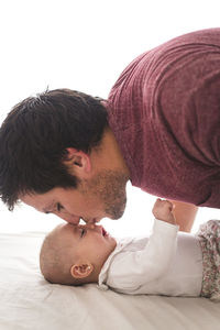 High angle view of father with daughter at home