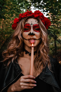 Portrait of young woman wearing mask