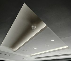 Low angle view of illuminated ceiling