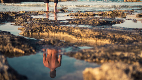 Low section of man on beach