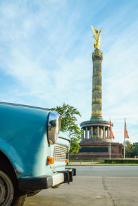 Statue of building against sky