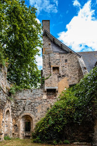 Low angle view of old building against sky