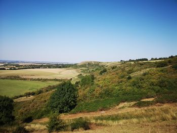 Scenic view of land against clear sky