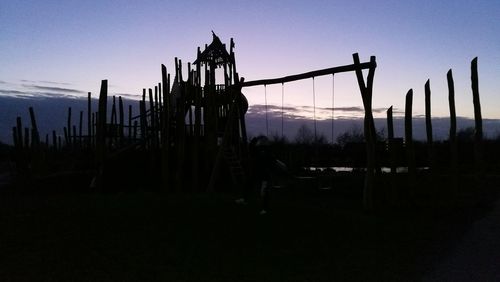 Silhouette of trees against sky