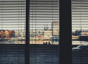 Buildings seen through glass window