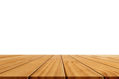 Full frame shot of hardwood floor against clear sky