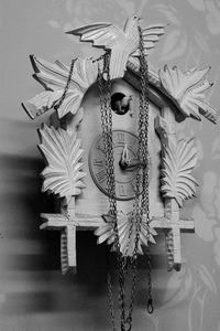 Close-up of decoration hanging against wall
