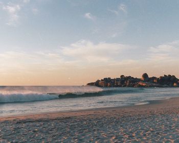 Scenic view of beach against sky