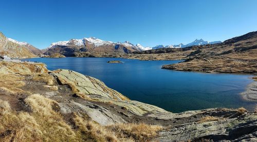 Scenic view of lake and mountains at grimsel pass