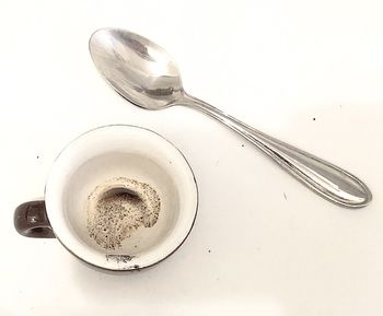 Close-up of coffee on table against white background