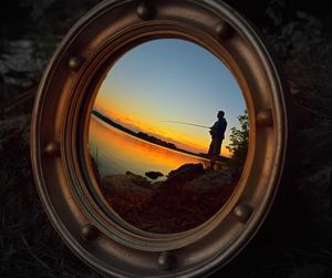 View of people at sunset