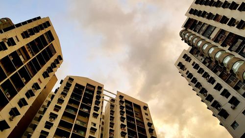 Low angle view of skyscrapers against sky