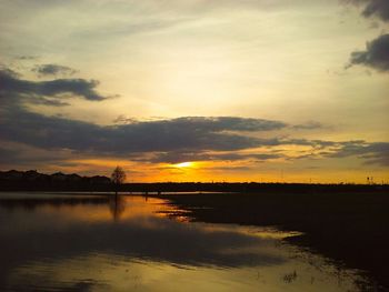 Scenic view of sea at sunset