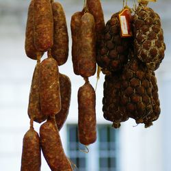 Close-up of dried fruits hanging on wood