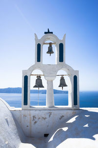 Bell tower by sea at santorini
