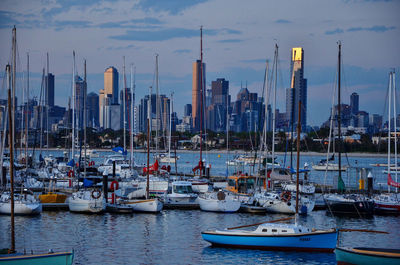 Boats moored at harbor