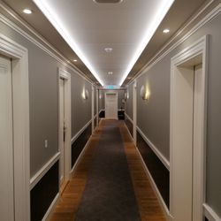 Illuminated corridor of building