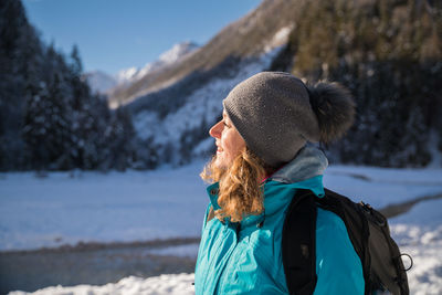 Rear view of woman in winter