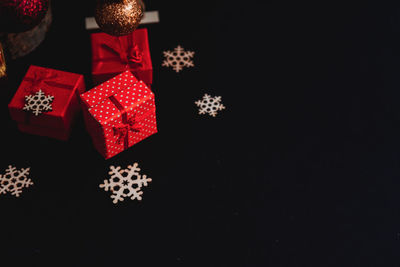 High angle view of christmas decorations in snow