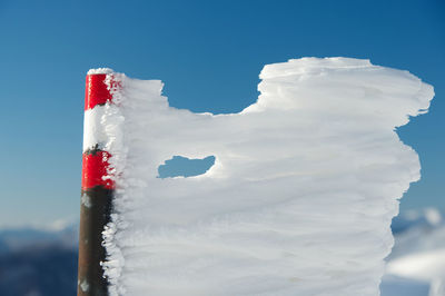 Close-up of ice cream against sky