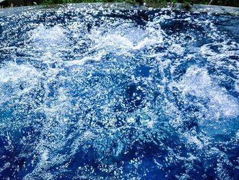 Waves splashing on rocks