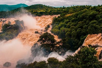 High angle view of waterfall against sky