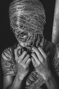 Close-up portrait of man wearing mask