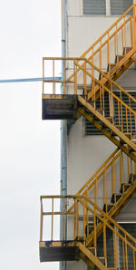 Low angle view of staircase against sky