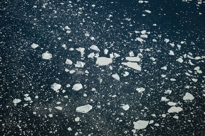 Full frame shot of snowflakes on snow