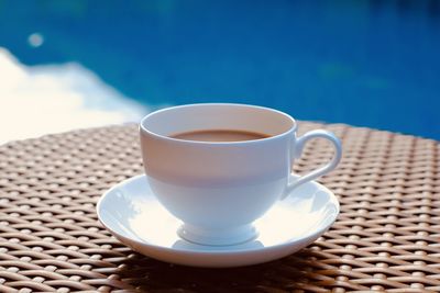 Close-up of coffee cup on table