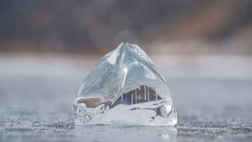 Close-up of ice crystals against glass