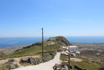 Scenic view of sea against blue sky