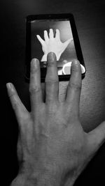 Close-up of cropped hand