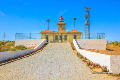 Low angle view of building against blue sky