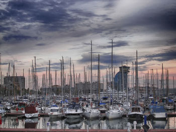 Boats moored at harbor