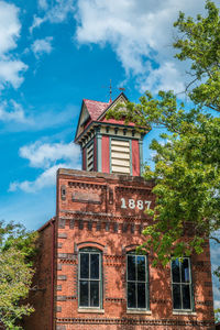 Low angle view of old building against sky