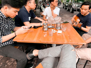 Young couple sitting on table at restaurant