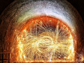 Close-up of illuminated lighting equipment