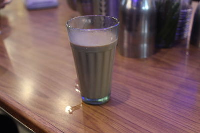 High angle view of drink in glass on table