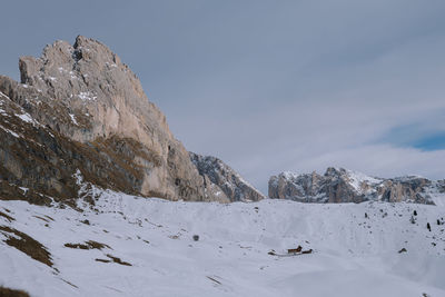 Scenic view of snowcapped mountains against sky.winter hike around seceda, south tyrol, italy